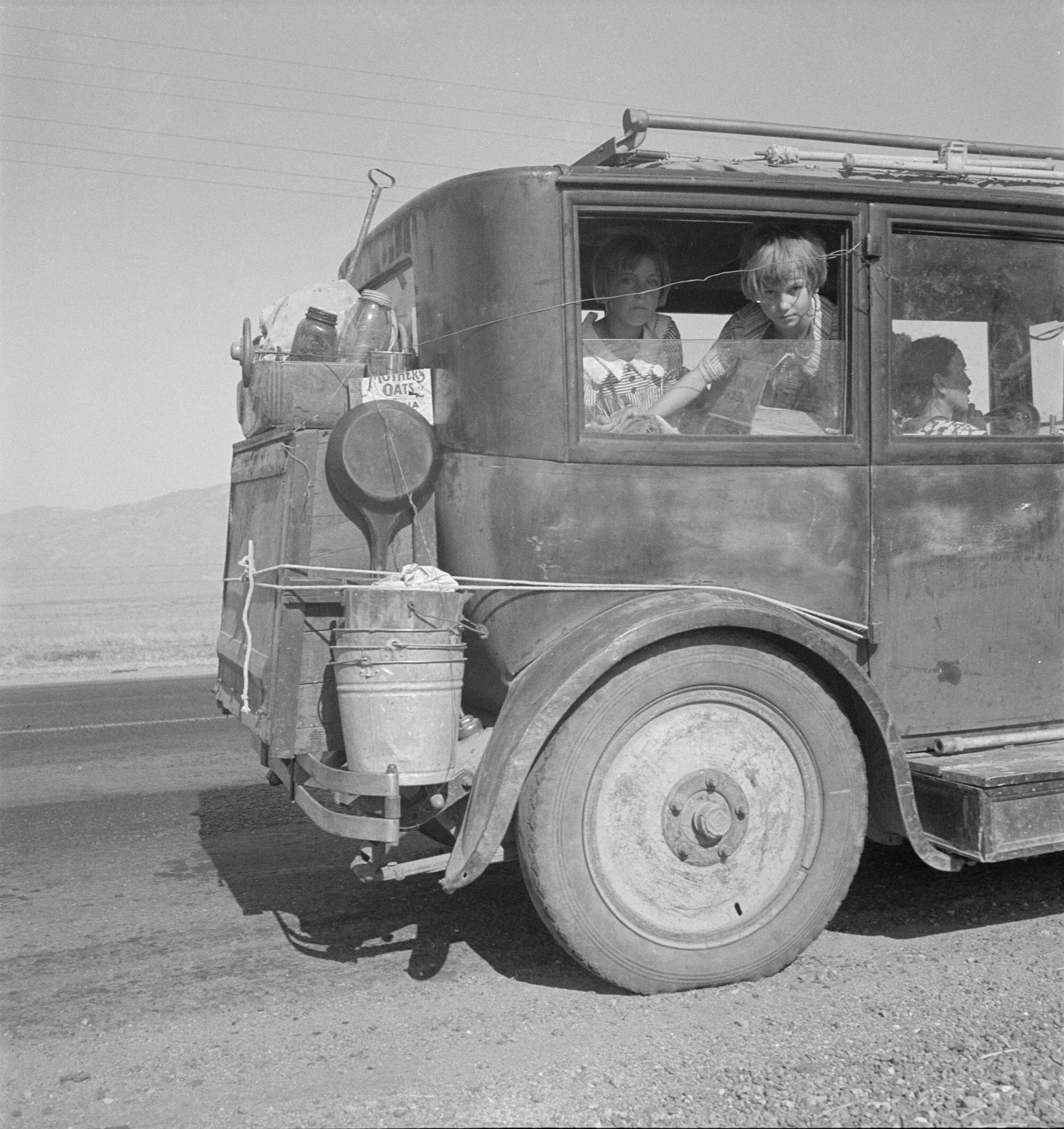 12. Dorothea Lange Family walking on highway - fiv