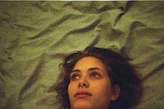 Emma in red polo neck