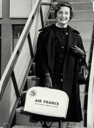 Paulette landing in New York, 1957