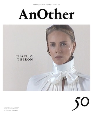 Charlize is wearing a cape in viscose jersey by DIOR