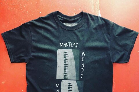 Man Ray Ready Made T Red Background