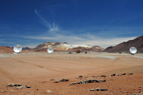 Three ALMA antennas on the plateau of Chajnantor