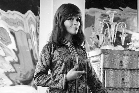 A model in the New York shop wearing a chiffon jumpsuit, 197