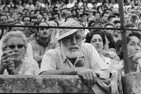Hemingway watches the running of the bulls at Pamplona in 19
