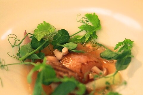 Smoked bone marrow with beef broth by Mauro Colagreco