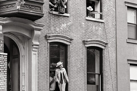Eli Cash escapes from the Tenenbaum house after a tryst with