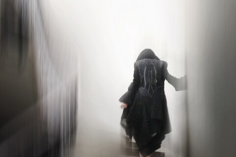 Coat by Alexander McQueen, S/S 2003; Black frock coat with f