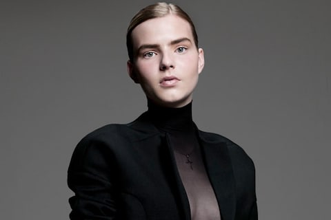 Darya wears cropped jacket, sheer turtleneck and latex leggi