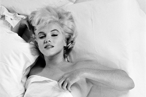 &#169; Eve Arnold Estate, Marylin Monroe rests between 