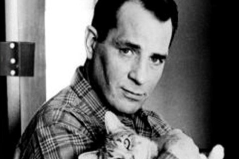 Jack Kerouac with a cat, 1965