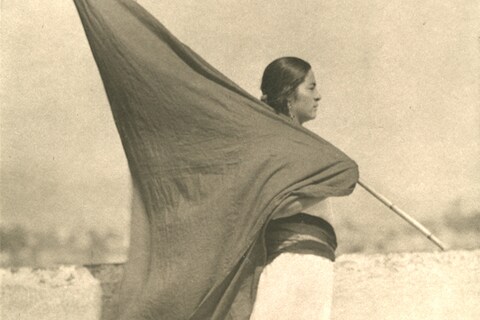 Tina Modotti, Woman with flag ca. 1928