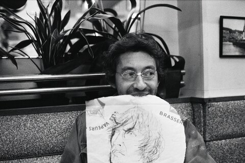 Serge sketching Andrew in a Trouville restaurant, 1977