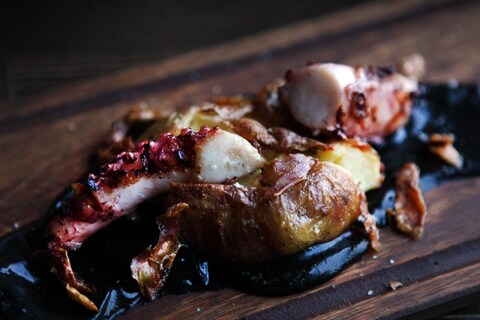 Grilled octopus with black garlic cr&#232;me fra&#238;che