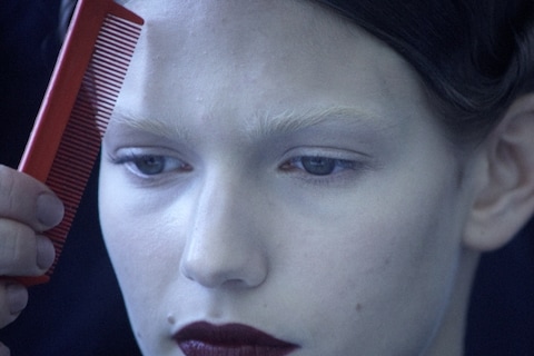 Model backstage at Yves Saint Laurent