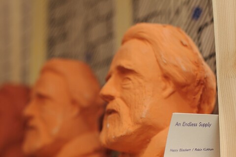 Terracotta penny-bank busts of John Ruskin at the colosseum