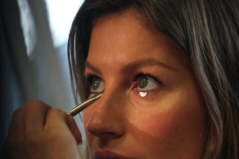 Gisele backstage at Givenchy S/S12