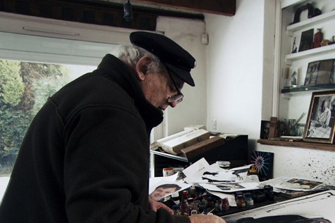 Ralph Steadman with artwork of Beanie the dog