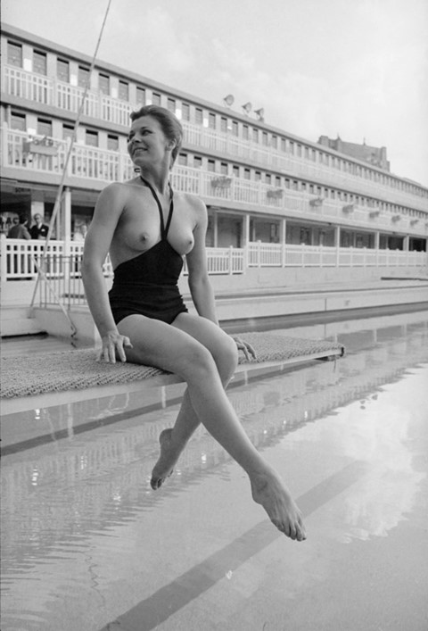 Daphne Dayle modeling a monokini, 1964