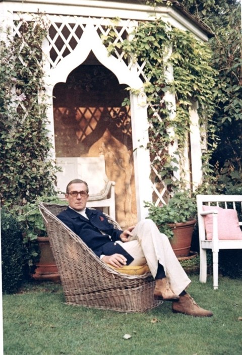 Hardy Amies relaxes in his country house, 1970s