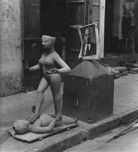 Khali standing on Shiva, side walk, Kumortuli, Kolkata
