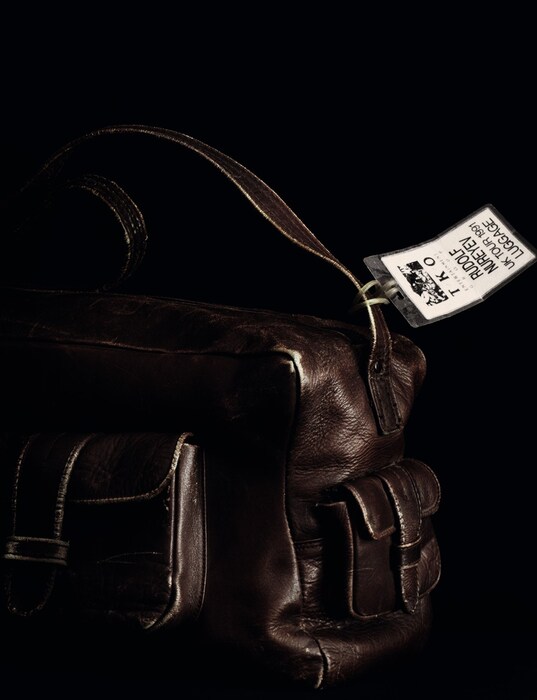 Leather travel bag with luggage tag for 1991 UK tour