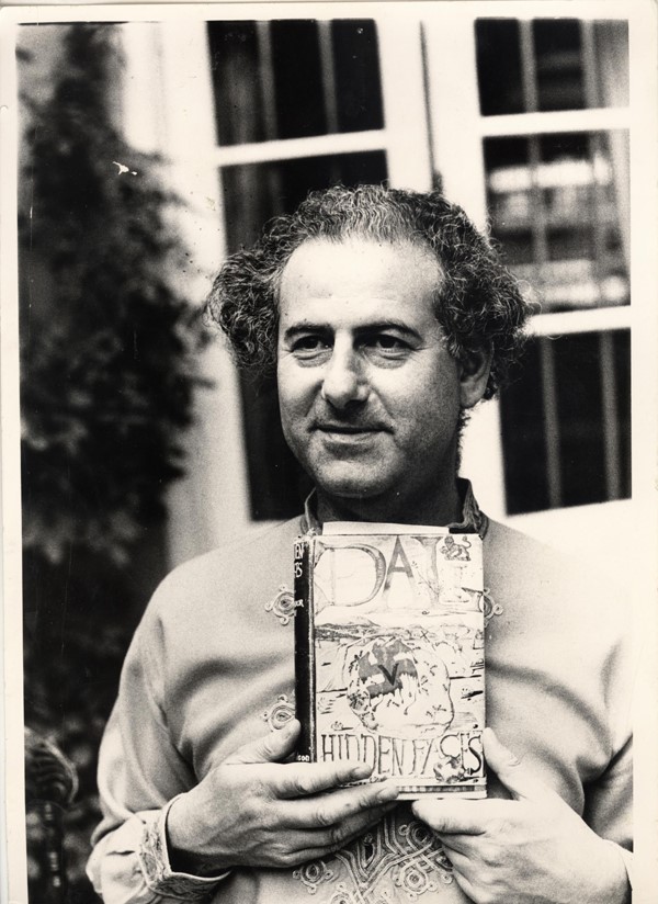 Peter Owen holding the first edition of Salvador Dali&#39;s only