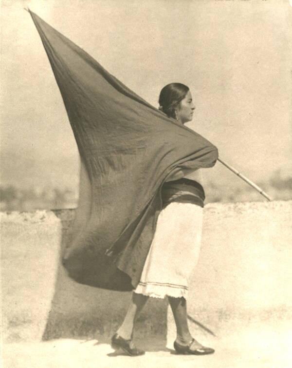 Tina Modotti, Woman with flag ca. 1928