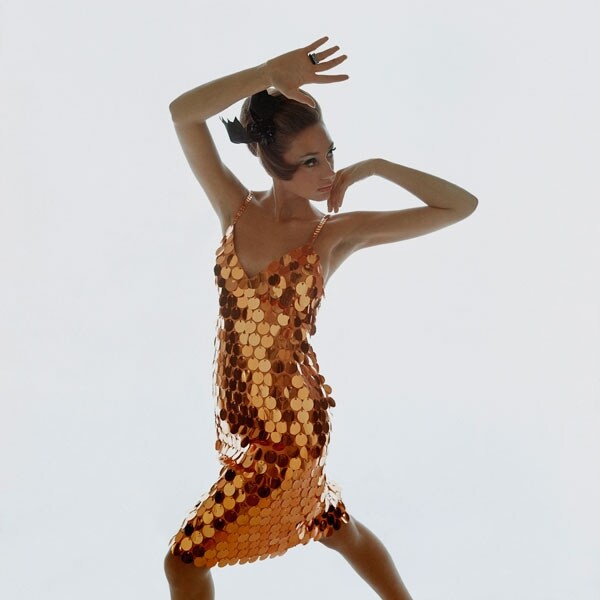In a copper-colored sequin dress by Gayle Kirkpatrick for At