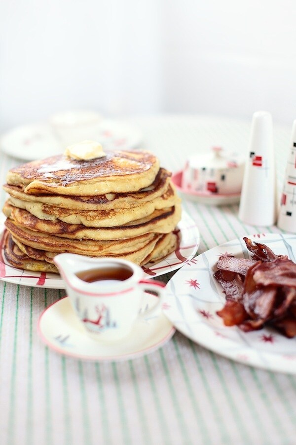 Jason’s ricotta pancakes served with bacon and maple syrup