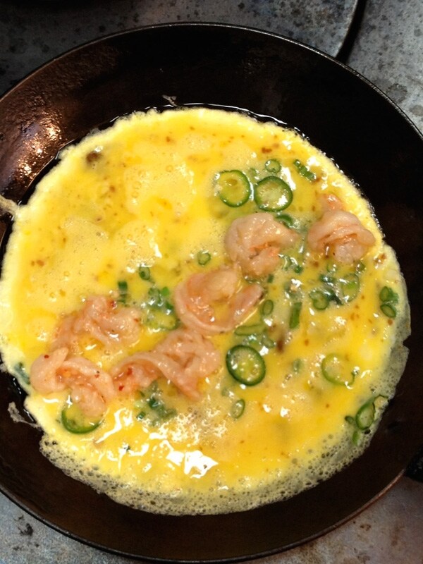 Adding the prawns