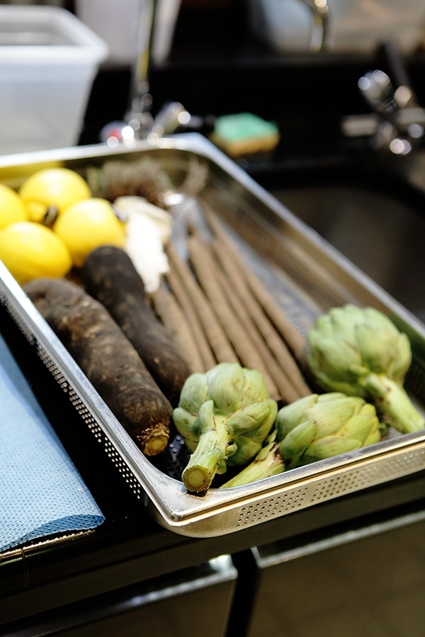 Vegetables ready for prepping at 1947, Le Cheval Blanc