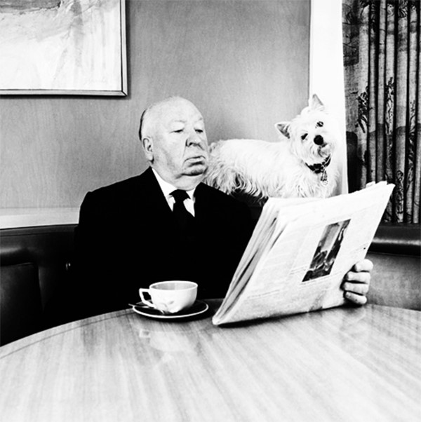 Hitchcock and Sarah reading a newspaper, 1974
