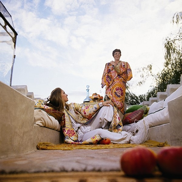 Talitha and J. P. Getty wearing his-and-hers caftans on the 
