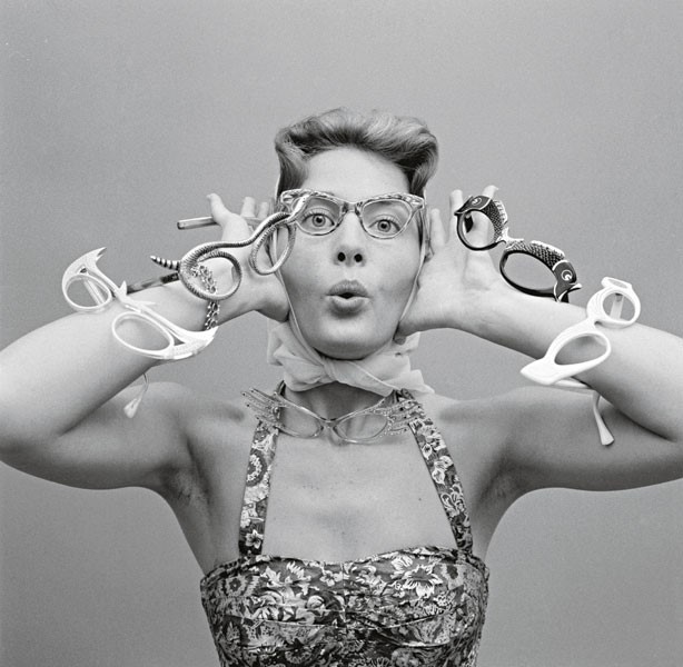 A model with the latest styles of spectacles, 1956