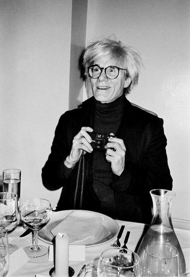 Andy Warhol with camera, New York 1985