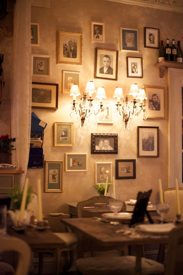 A photo wall at Mari Vanna