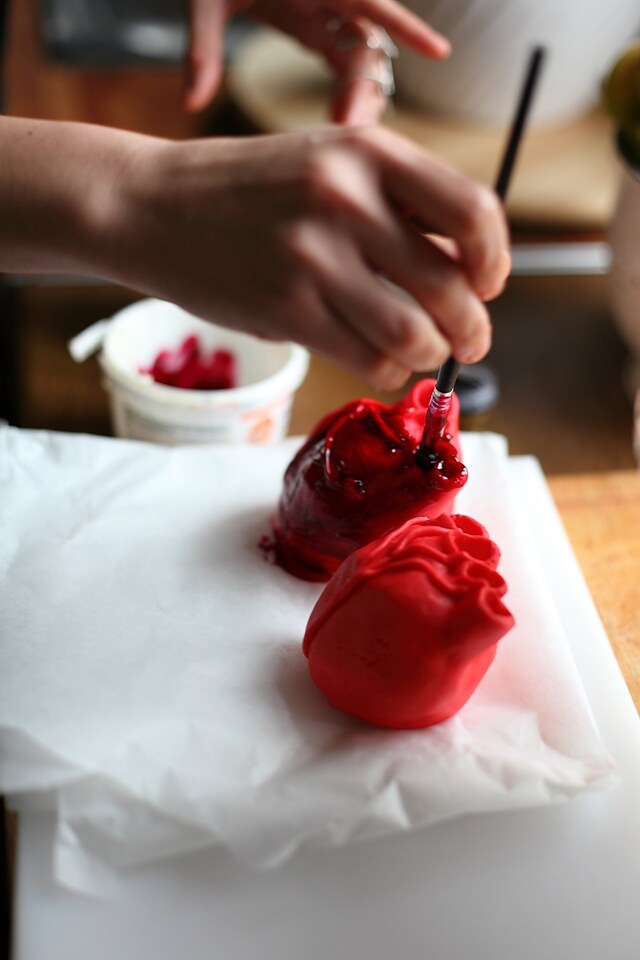 Lily paints the hearts