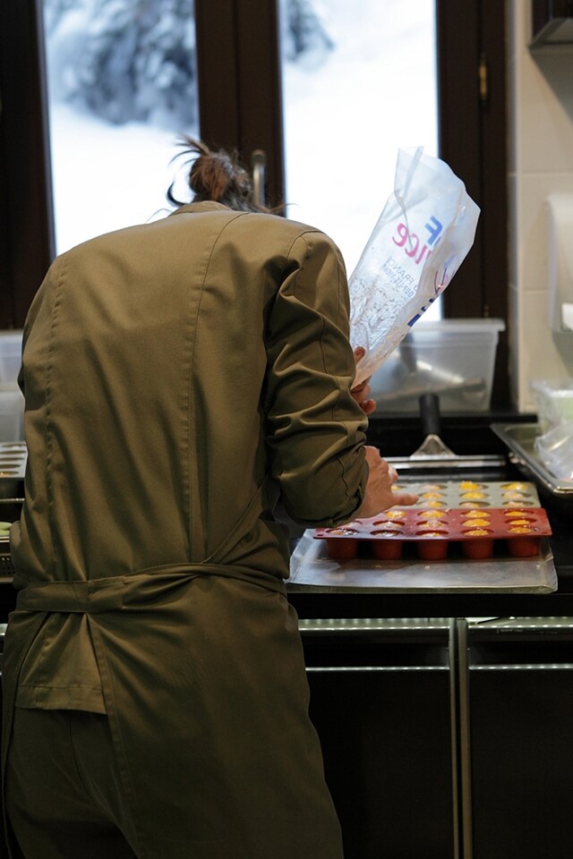 A member of the All&#233;no team prepping in the kitchen at 1947