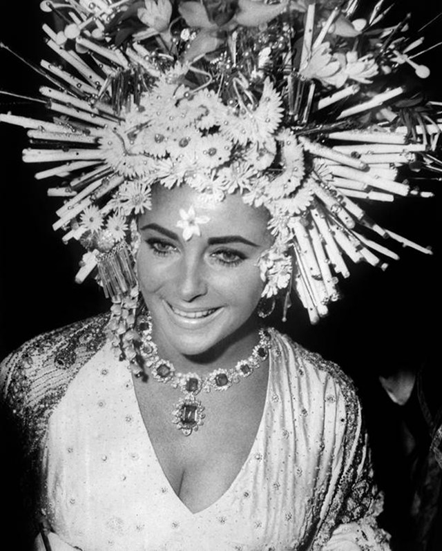Elizabeth Taylor wears Bulgari jewellery at the masked ball,
