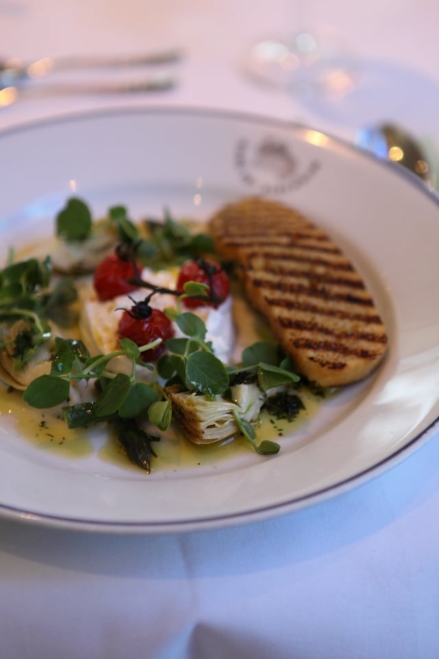 Buratta with artichokes, asparagus and roast cherry tomatoes