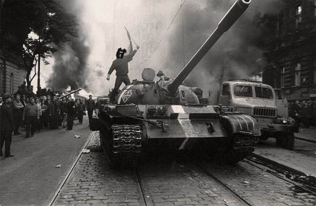 (Student on tank, eyes crossed out), from the series Invasio