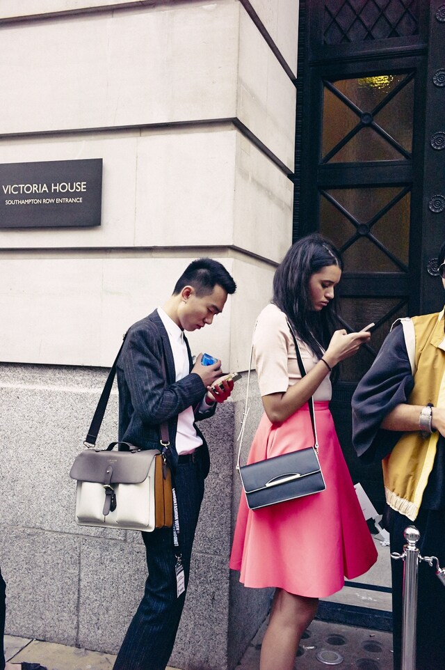 On the Phone at London Fashion Week S/S15
