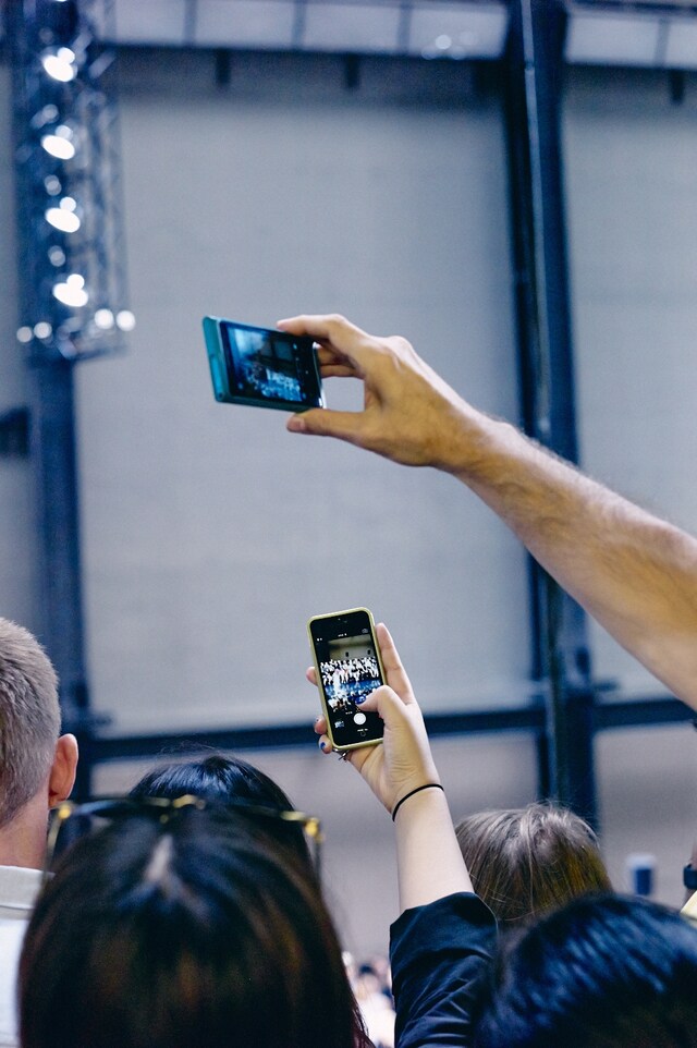 On the Phone at London Fashion Week S/S15
