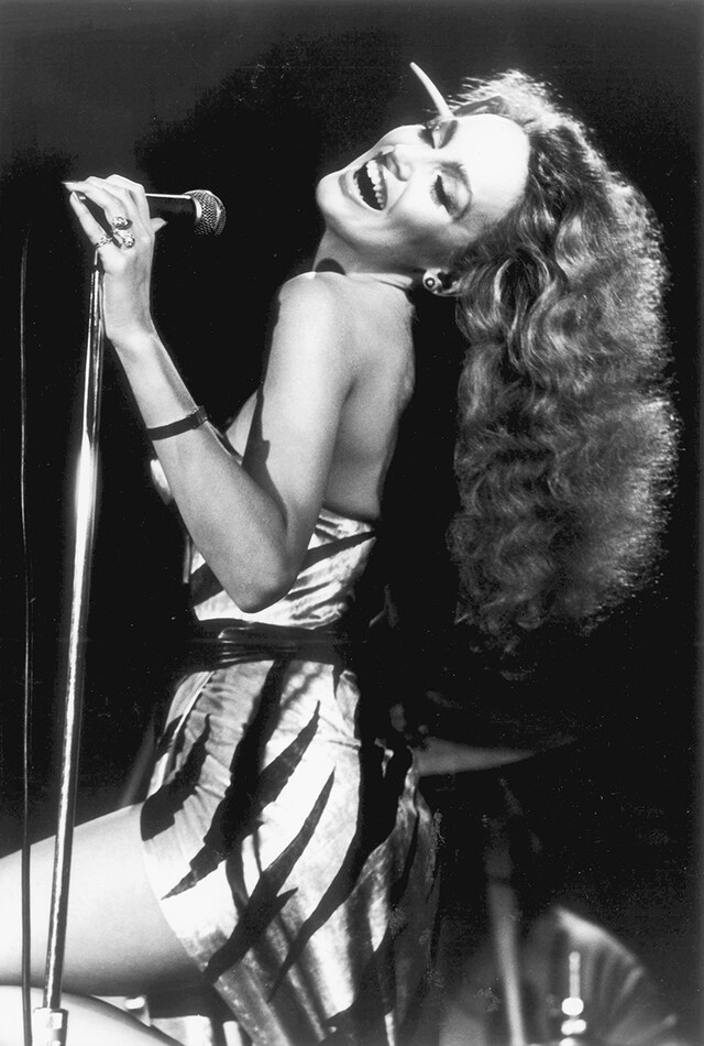 Jerry Hall Performs on stage with Brian Ferry, London, 1977