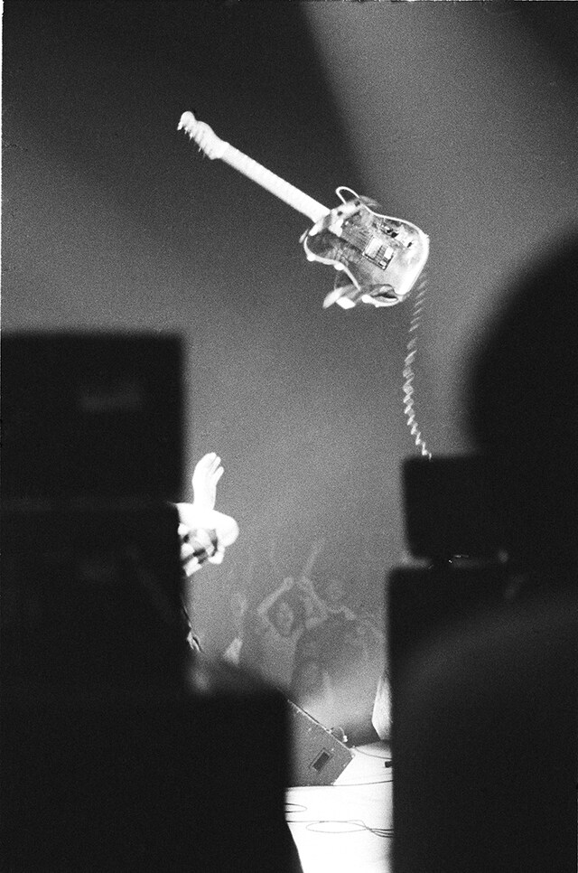 Pete Townshend of The Who throws his guitar in the air on st