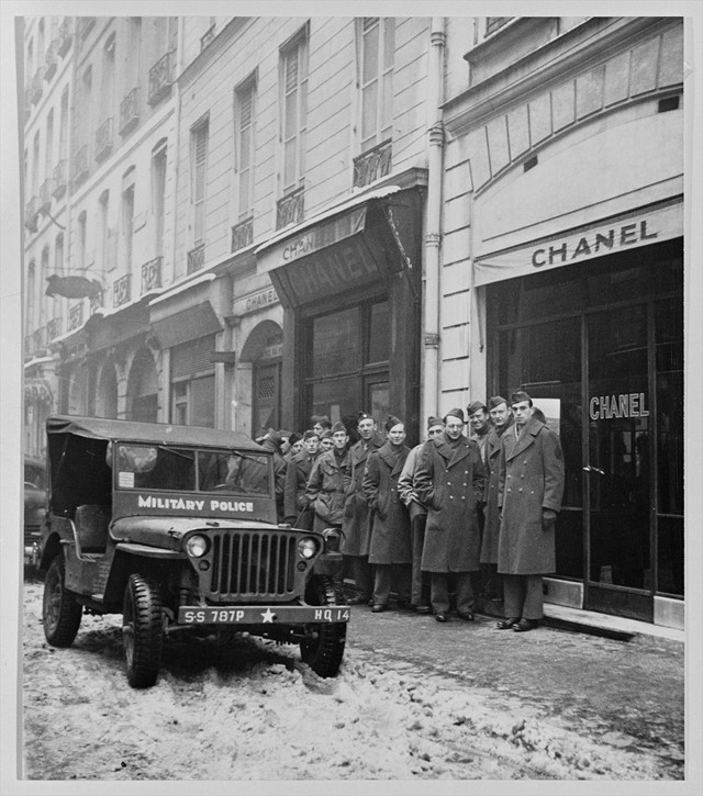 Queues of American G.I.s outside Chanel boutique in Paris, 1