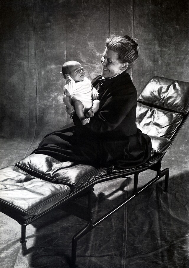Ray Eames with great-grandchild on a Soft Pad Chaise, 1988