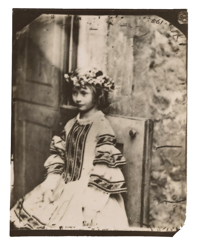 Alice Liddell in wreath as “Queen of May,”