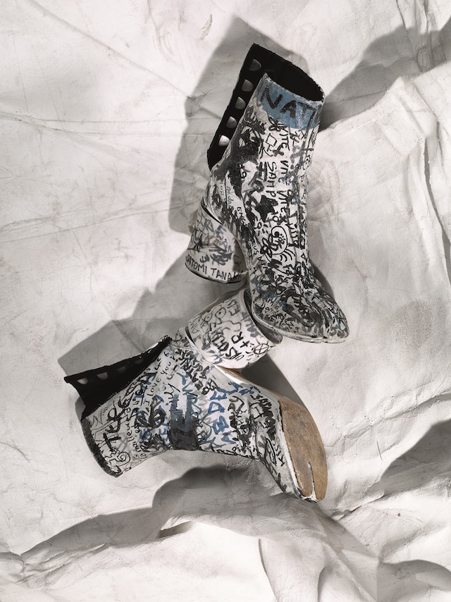 Maison Martin Margiela tabi boots covered in graffiti by fan