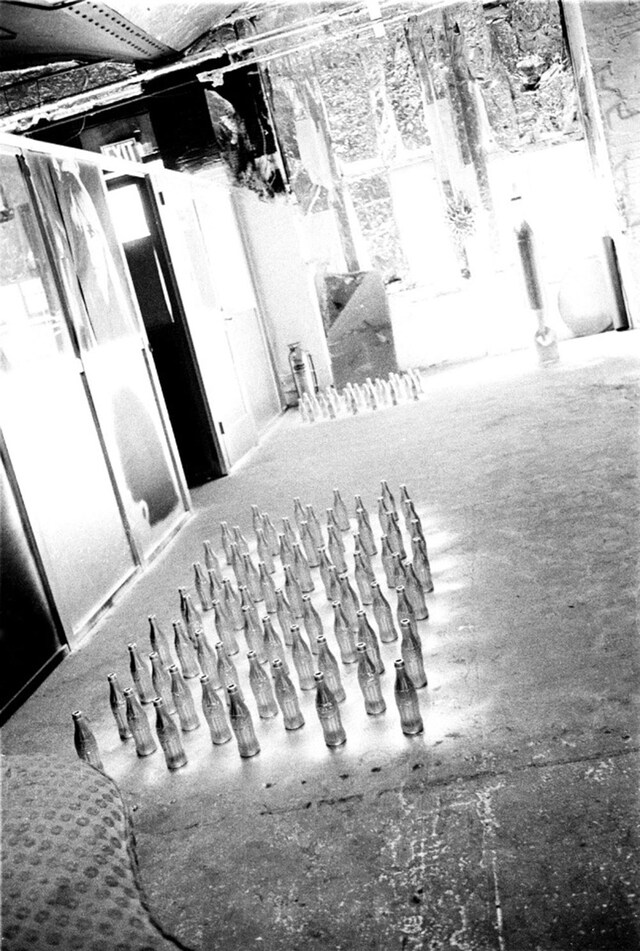 Silver Coke Bottles drying on the Factory floor, 1964